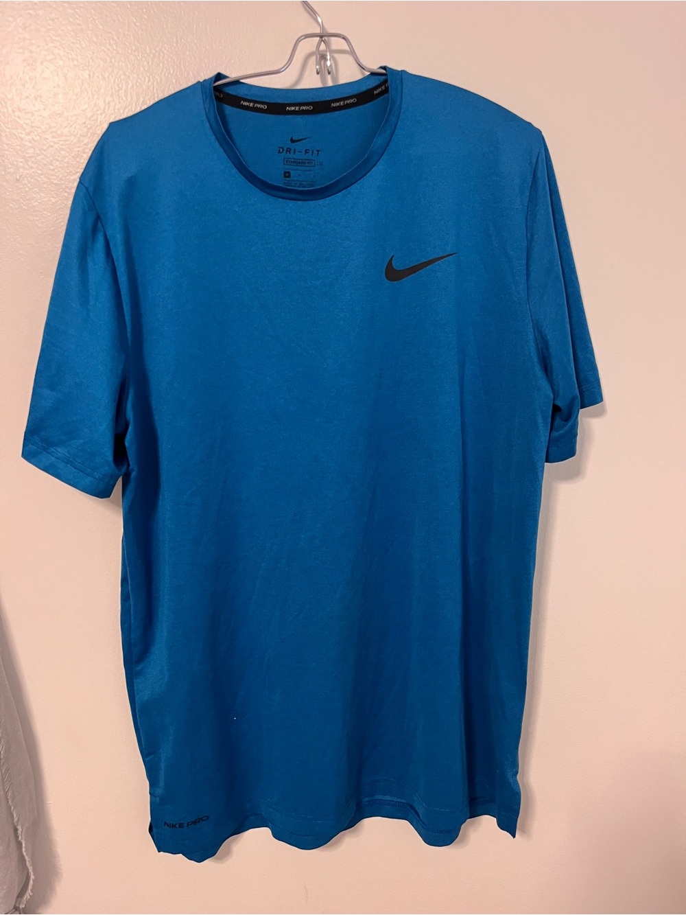 Nike Blue Men's Short-Sleeve Dri-FIT Tee with Black Swoosh